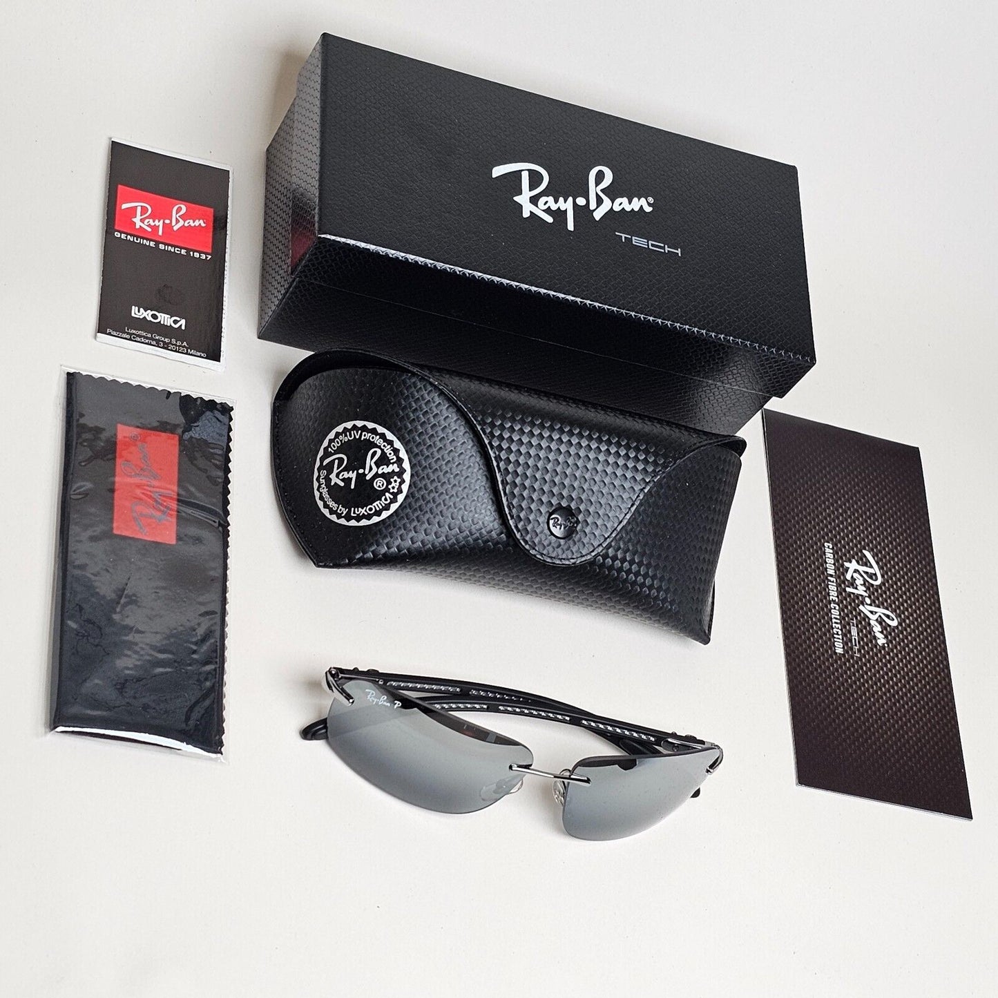 Ray-Ban Sunglasses 2011 Polarized Rimless Carbon Fibre Black RB 8303 004/82