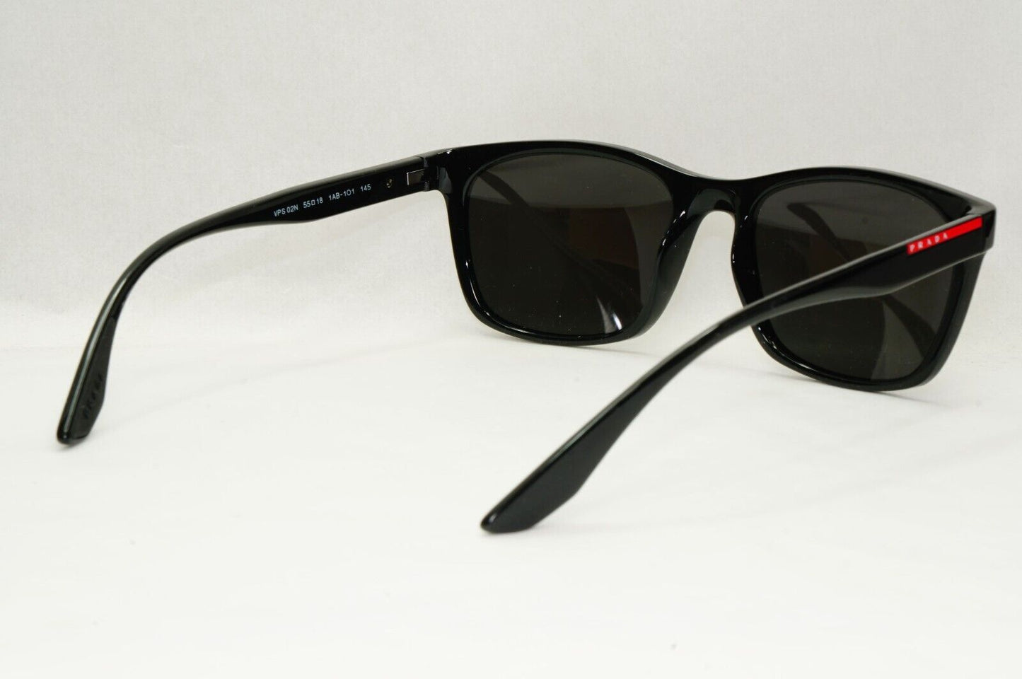 Prada Sunglasses Black Glossy Square Red Stripe PS02NV VPS 02N 1AB-1O1 55mm