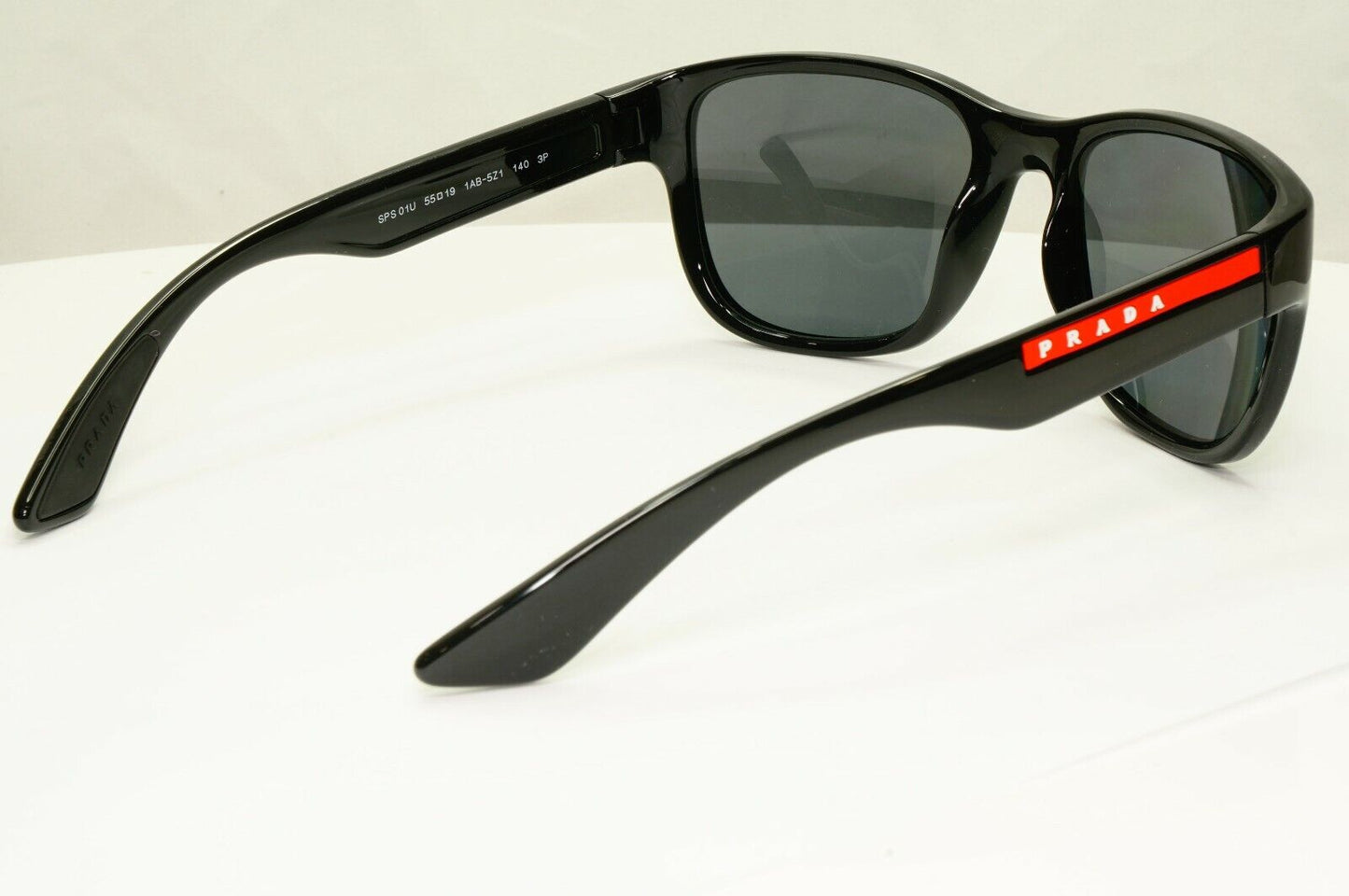 Prada Polarised Black Sunglasses Square Red Stripe PS01US SPS 01U 1AB-5Z1 55mm