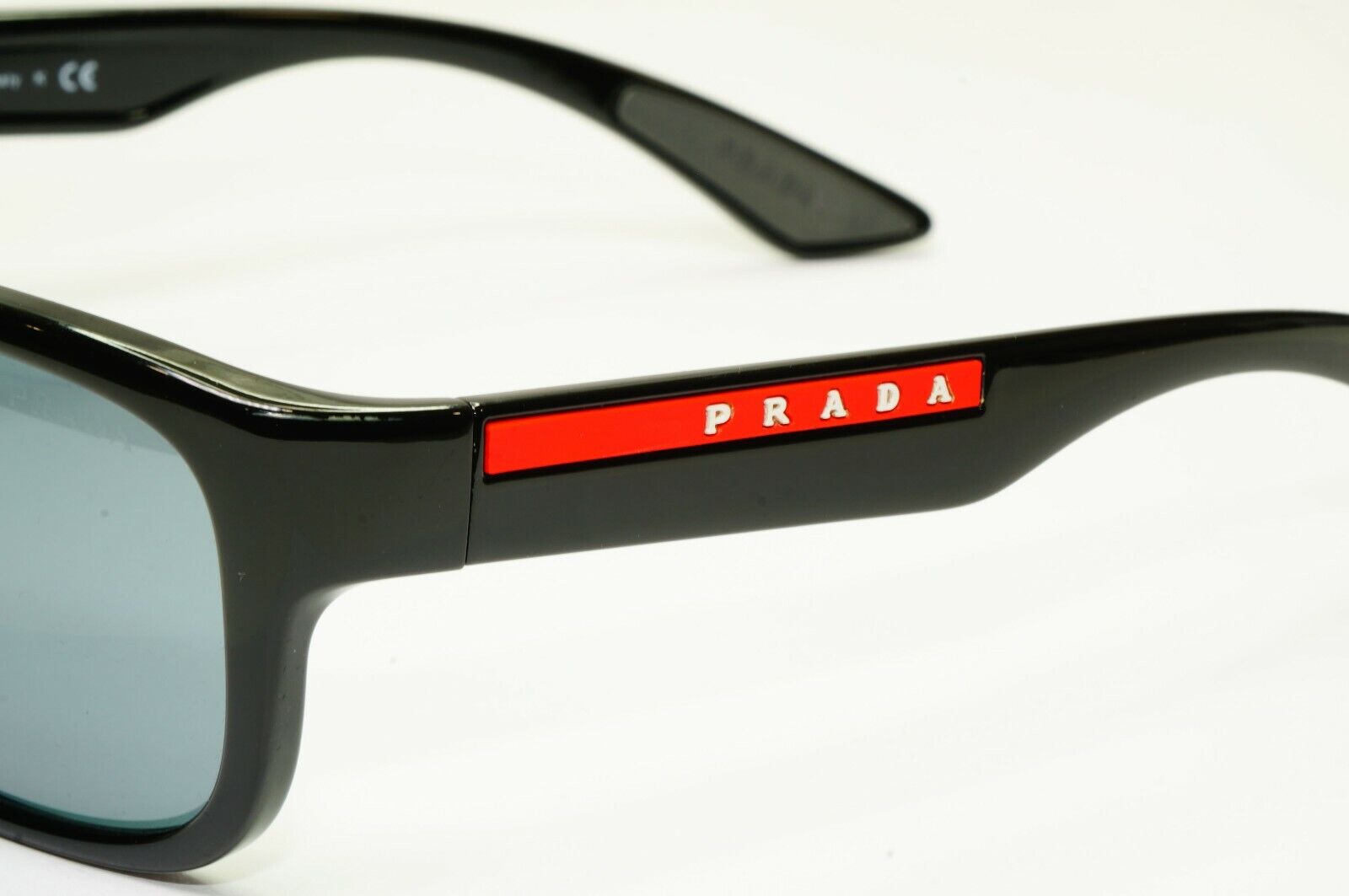 Prada Sunglasses Black Ice Grey Mirror Mens SPS 05V 1AB-5L0 Red Stripe Sport