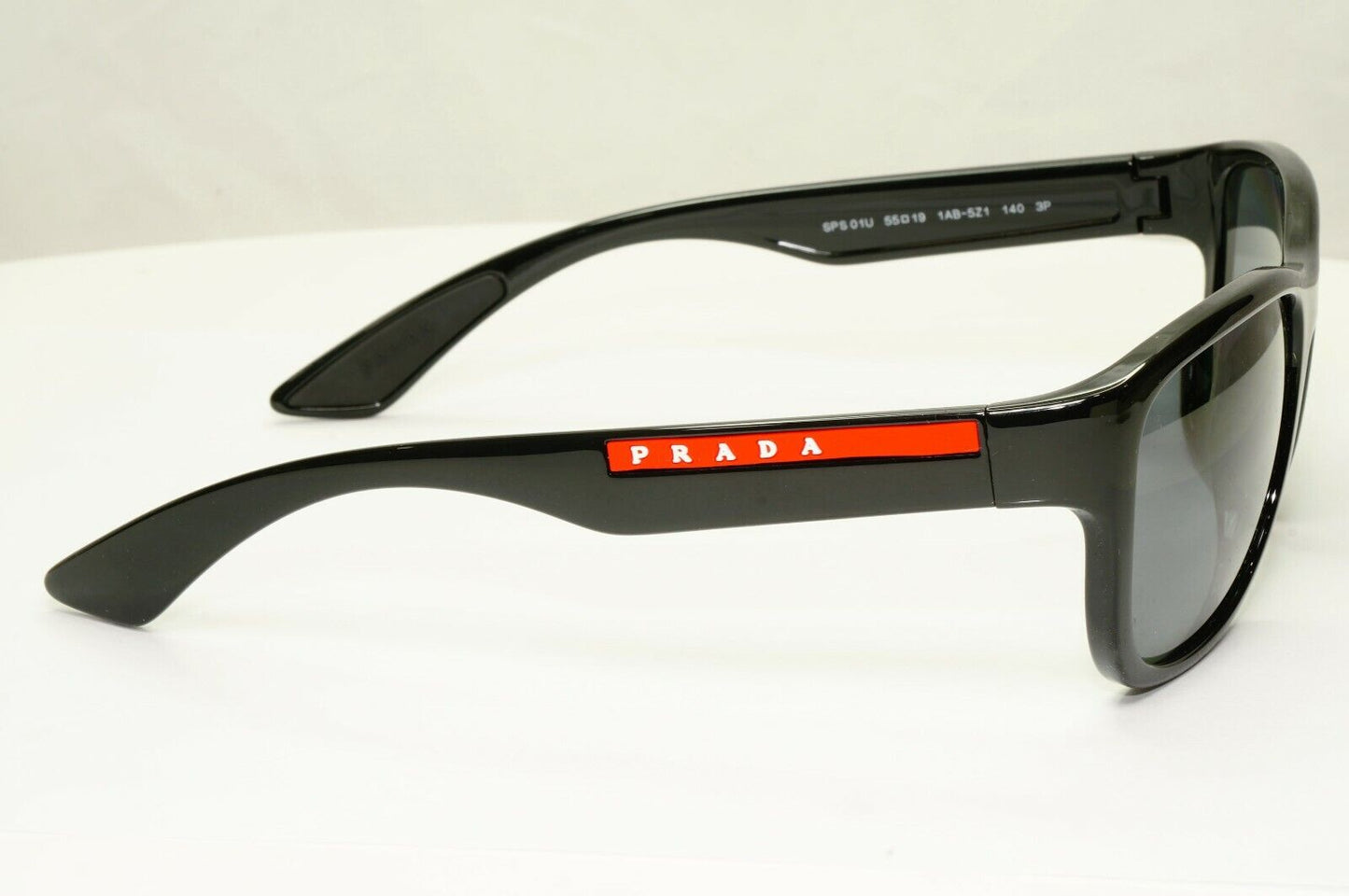 Prada Polarised Black Sunglasses Square Red Stripe PS01US SPS 01U 1AB-5Z1 55mm