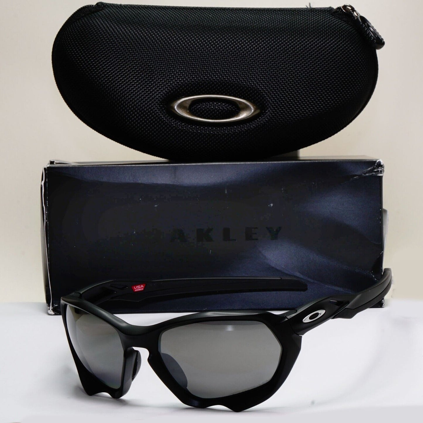 Oakley Sunglasses Plazma Polarised Black Matte Prizm Square Wrap OO 9019 06