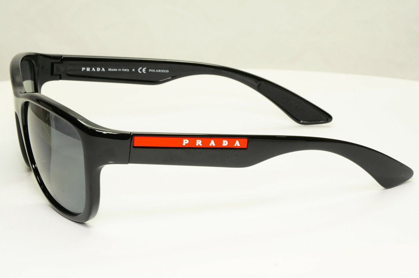 Prada Polarised Black Sunglasses Square Red Stripe PS01US SPS 01U 1AB-5Z1 55mm