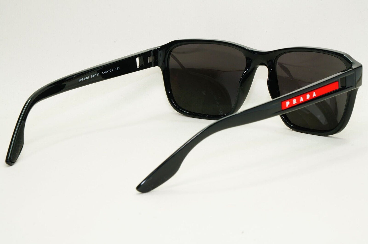 Prada Sunglasses Black Glossy Square Red Linea Rossa PS04NV VPS 04N 1AB-1O1 54mm