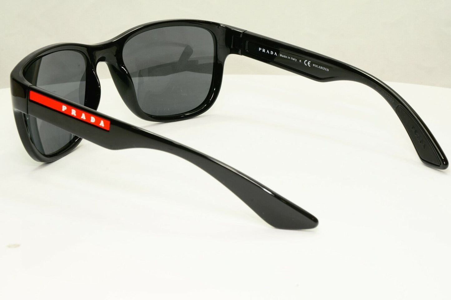 Prada Polarised Black Sunglasses Square Red Stripe PS01US SPS 01U 1AB-5Z1 55mm