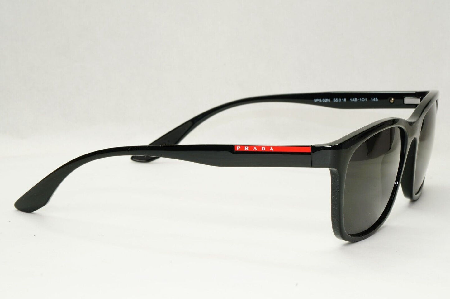 Prada Sunglasses Black Glossy Square Red Stripe PS02NV VPS 02N 1AB-1O1 55mm