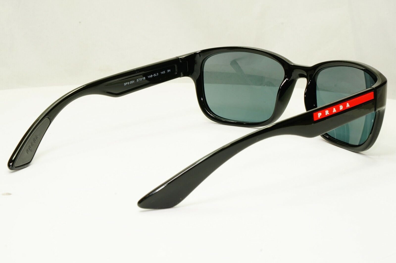 Prada Sunglasses Black Ice Grey Mirror Mens SPS 05V 1AB-5L0 Red Stripe Sport