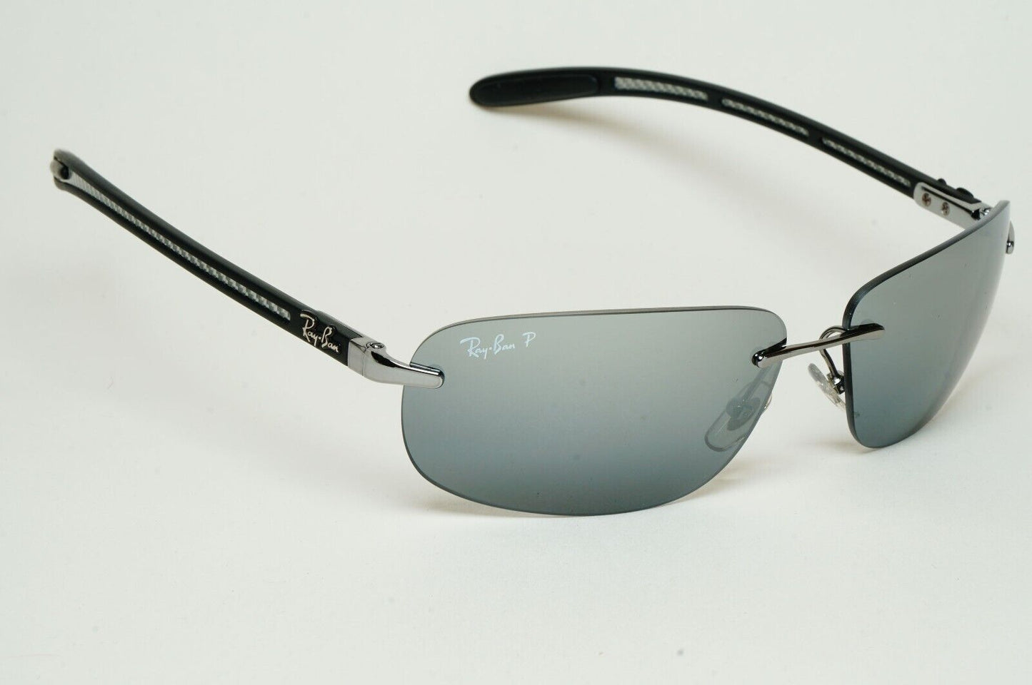 Ray-Ban Sunglasses 2011 Polarized Rimless Carbon Fibre Black RB 8303 004/82