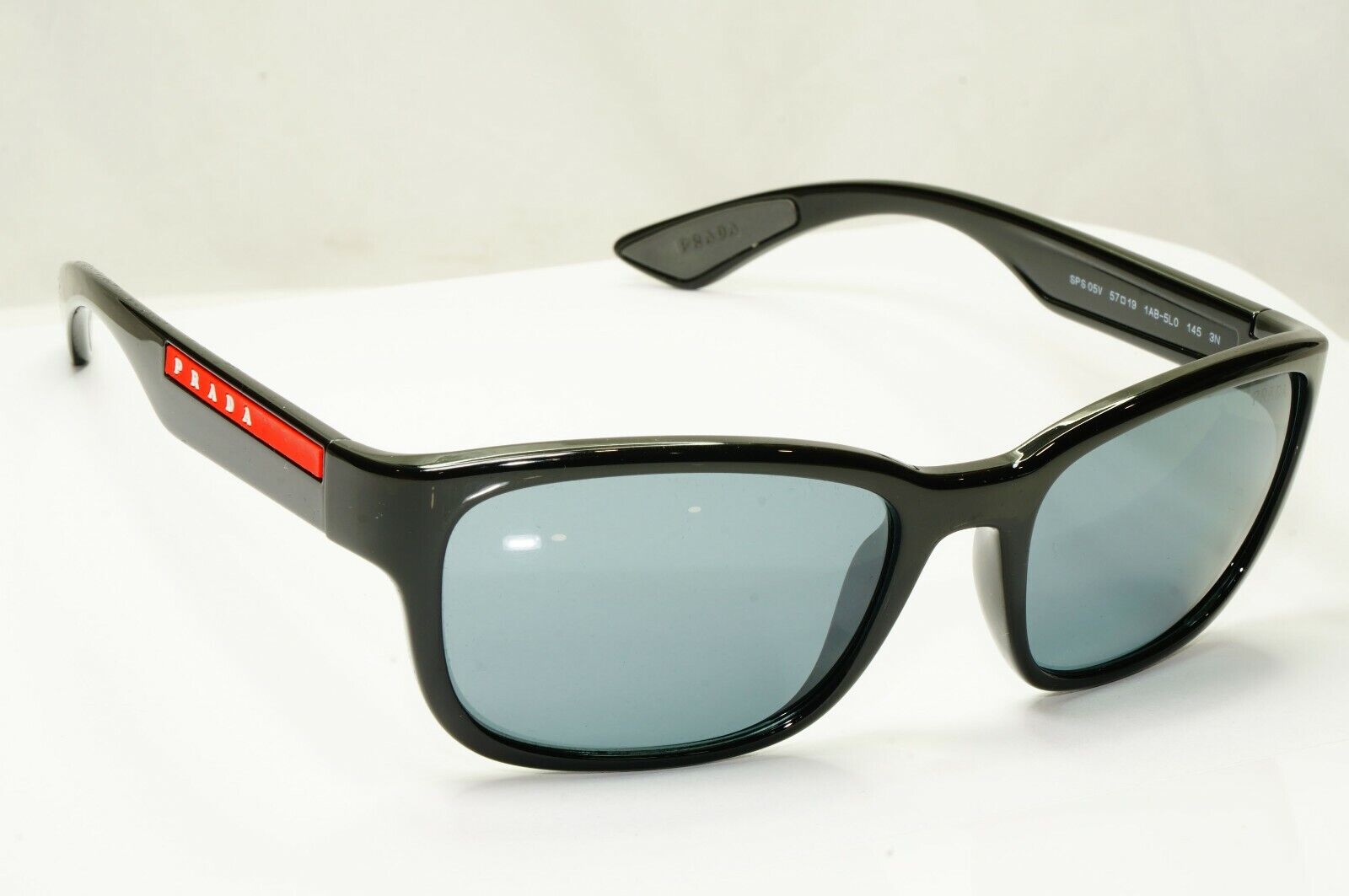 Prada Sunglasses Black Ice Grey Mirror Mens SPS 05V 1AB-5L0 Red Stripe Sport